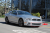 2014-Ford-Mustang-V6-front-view-in-motion.png